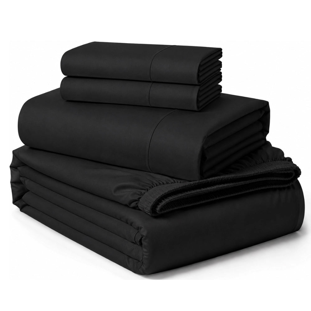 Black luxury bed sheets folded for premium bedroom styling