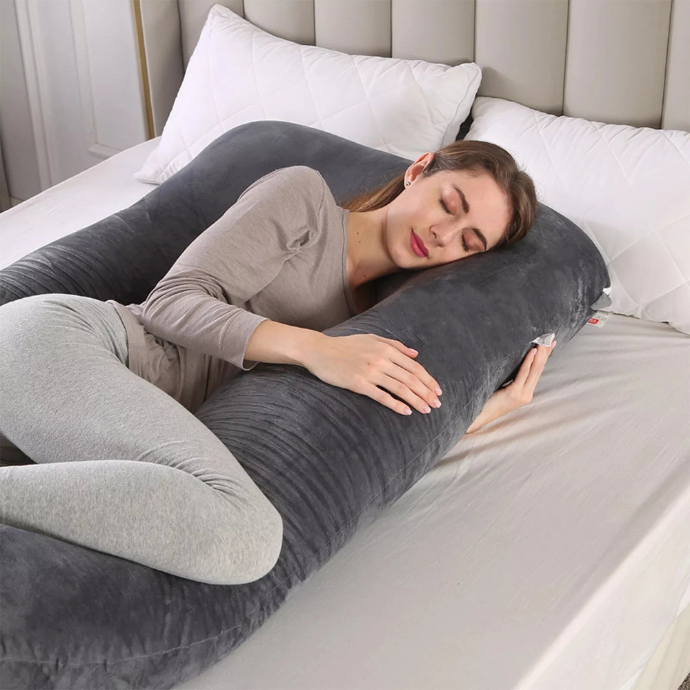 woman side sleeping on grey pillow for full body support
