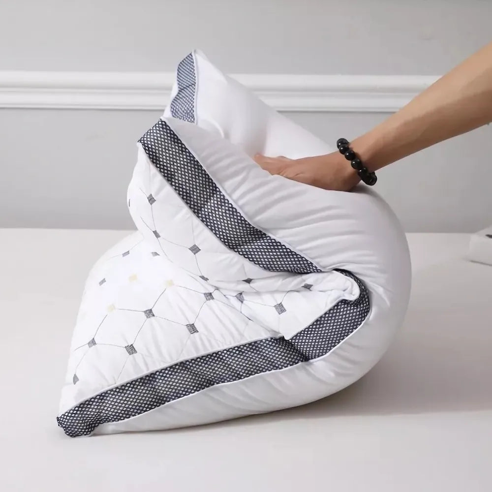 DreamHaven pillow folded in half to show flexibility and premium fill