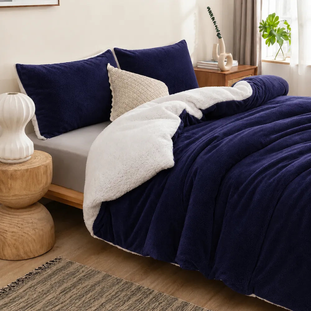 EverWarm Midnight Navy Sherpa quilt cover set with ultra-soft teddy fleece, white sherpa reverse and matching pillowcases.