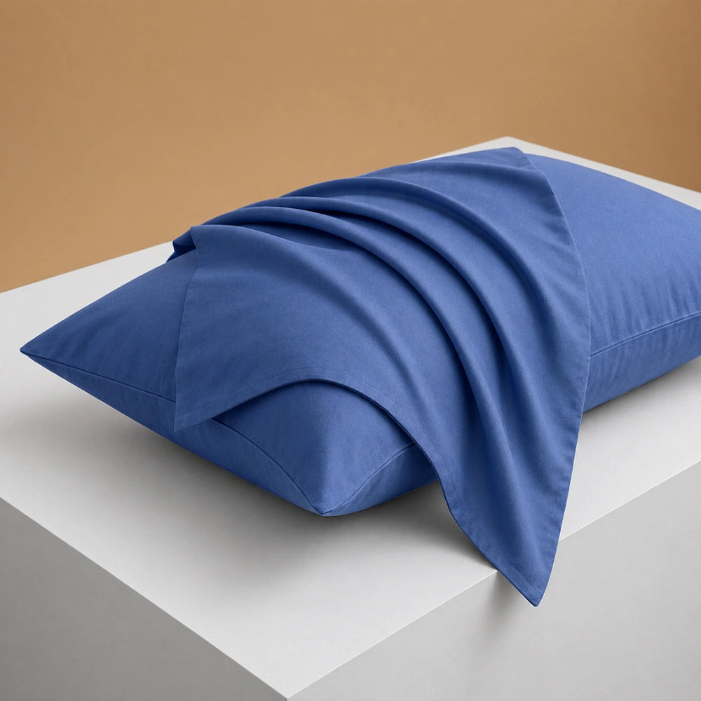 deep ocean blue pillowcase styled on pillow for a calm cotton pillowcase look