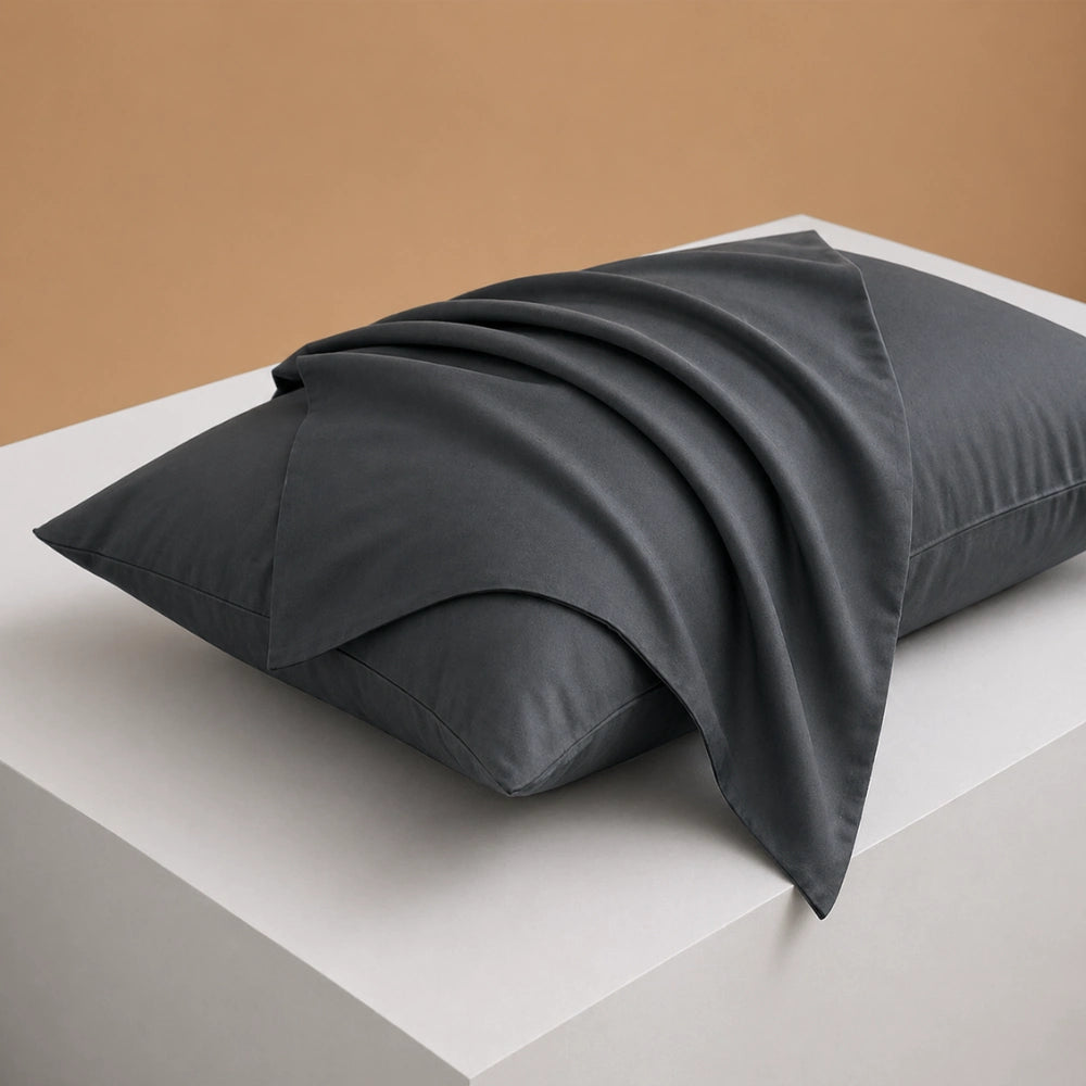 midnight black pillowcase styled on a pillow for a modern cotton pillowcase finish