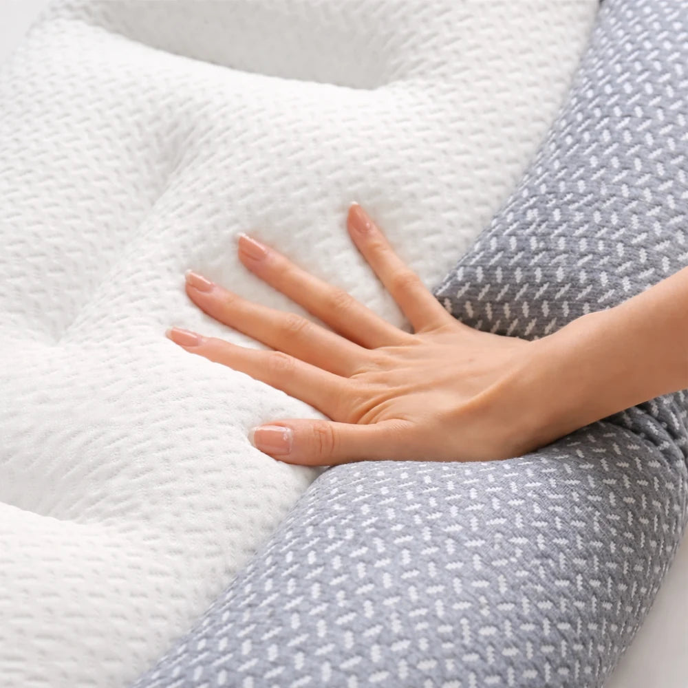 hand pressing into soft pillow showing pressure relief memory foam pillow