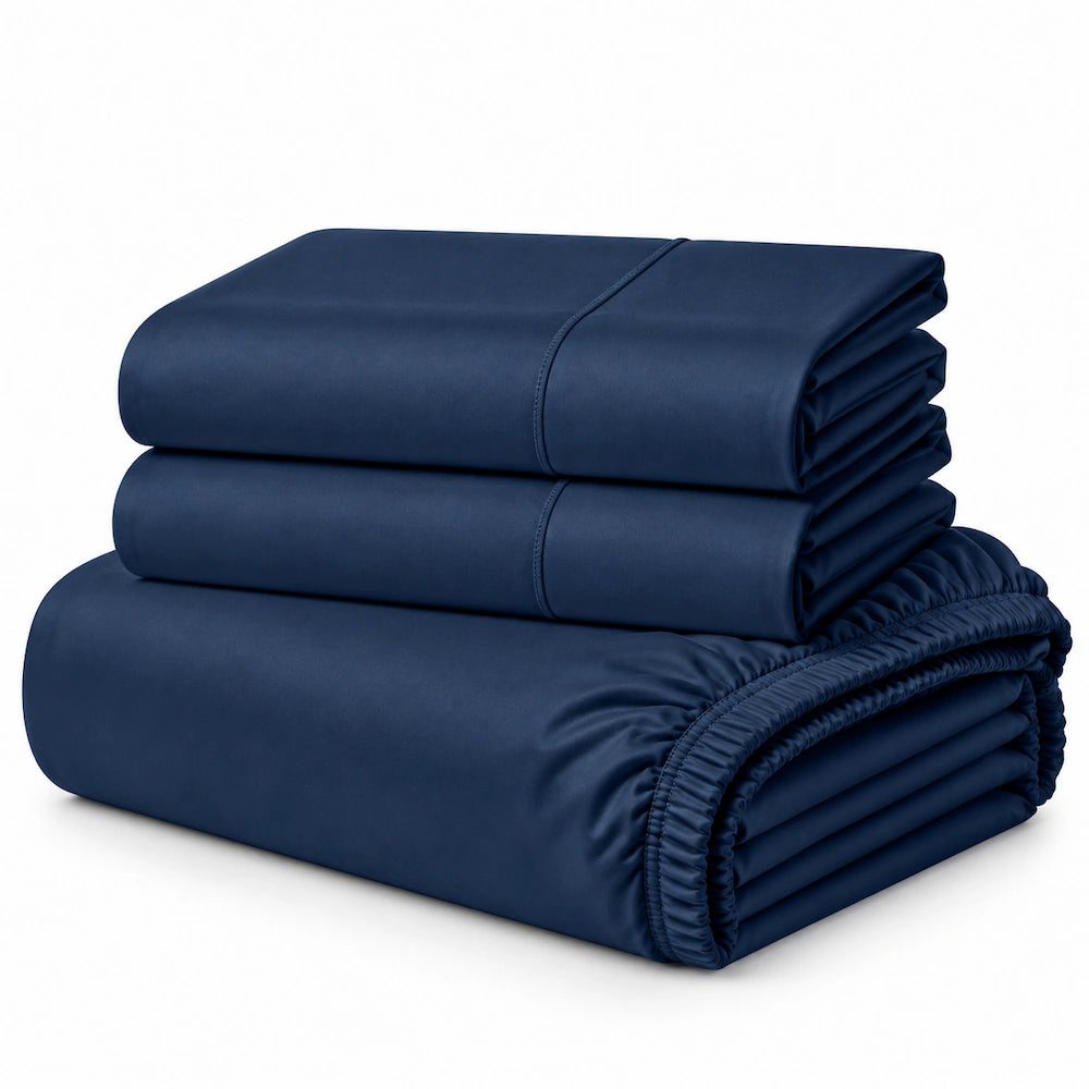 Navy Egyptian cotton fitted sheet and pillowcase set neatly folded
