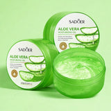 open jar with gel swirl next to closed containers on green background soothing moisturiser