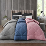 Grey blue and pink quilts displayed together showcasing bamboo bedding
