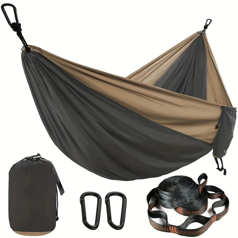 Durable camping hammock in black and khaki with carry bag and carabiners