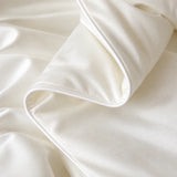 Cloud White cooling blanket fabric showing a smooth premium finish