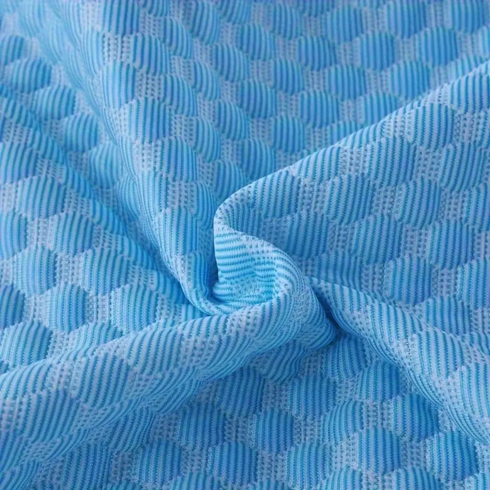 close-up of cooling fabric with breathable textured pattern