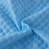 close-up of cooling fabric with breathable textured pattern