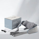 Grey cordless neck massager used for soothing tension at home, neck massager