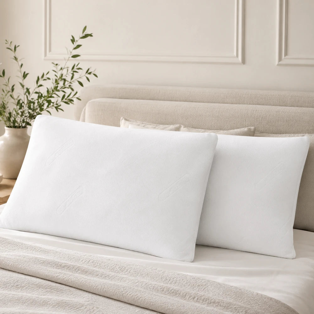 DreamCool CoolMax pillowcase styled on a bed in a premium neutral bedroom