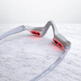 Front view of electric eye massager on marble