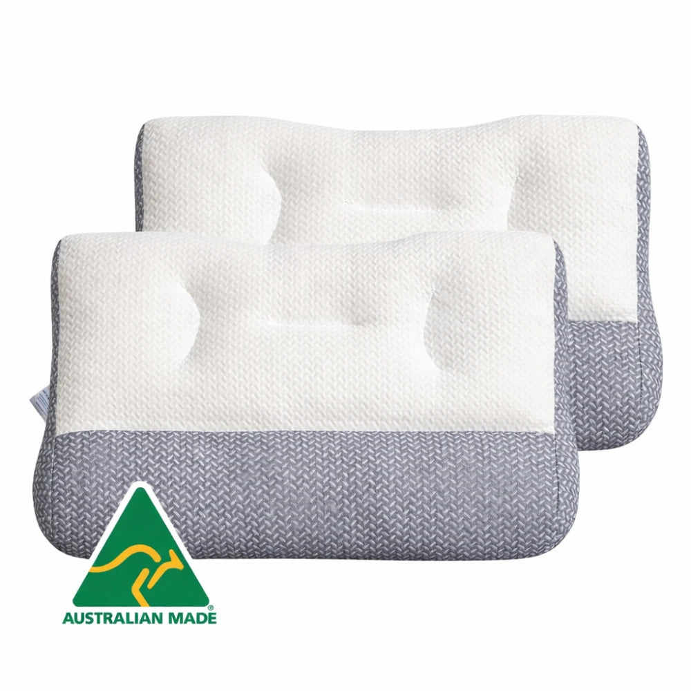 two contour pillows stacked on white background ergonomic pillow