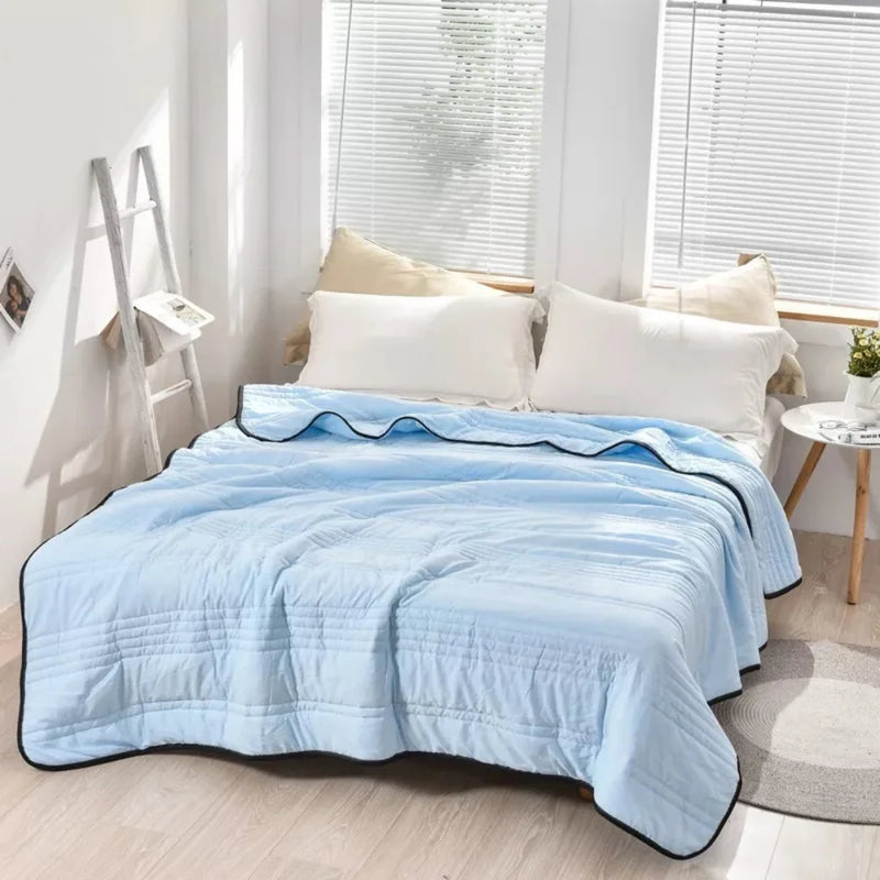 Sky Blue Cooling Summer Blanket with Lightweight Fabric for a Cool Night Sleep