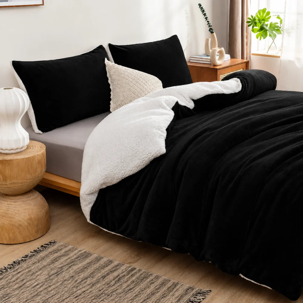 Black sherpa quilt cover creating a luxurious bedroom look