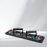Foldable push up board laid flat with detachable handles, push up board