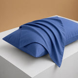 deep ocean blue pillowcase styled on pillow for a calm cotton pillowcase look