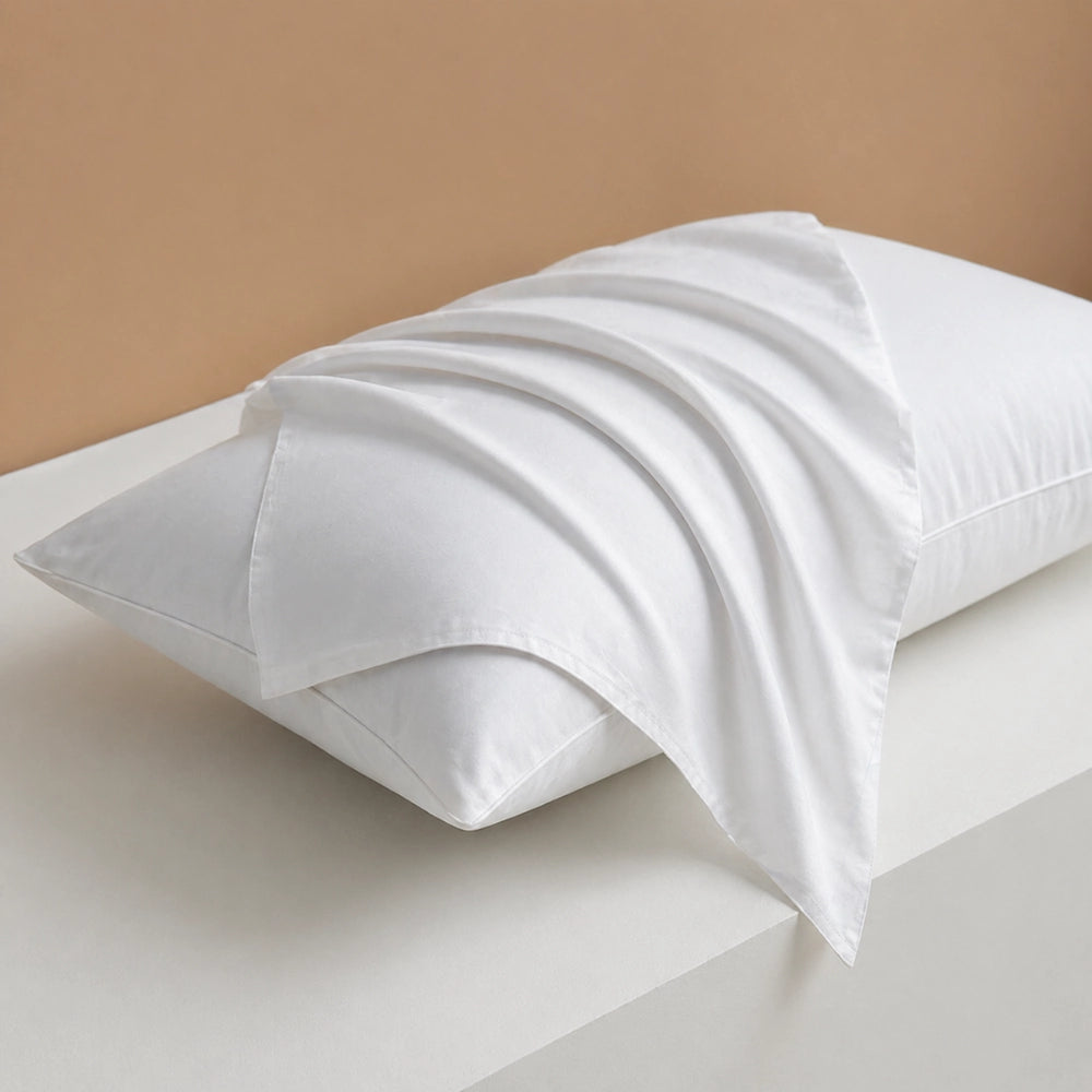 pearl white pillowcase styled neatly on a bed for a fresh cotton pillowcase look