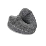 Grey contour pillow designed for leg support and sciatica relief