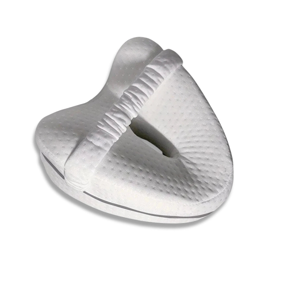 white knee pillow with strap for side sleeping support