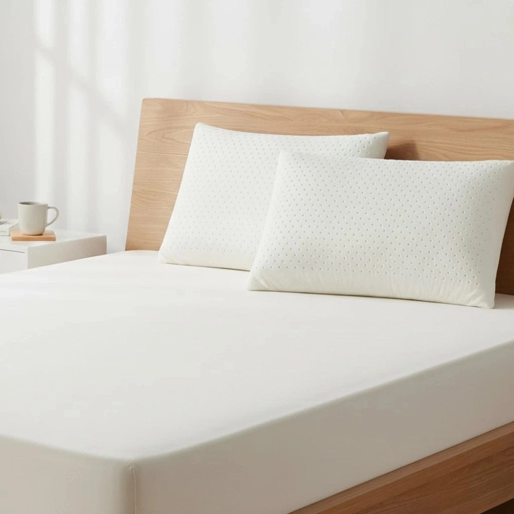 Latex pillow styled on a premium bed for everyday comfort