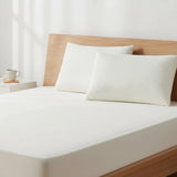 Latex pillow styled on a premium bed for everyday comfort