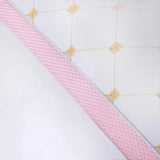 Close-up of luxury hotel pillow with pink trim, premium comfort bedding for better sleep