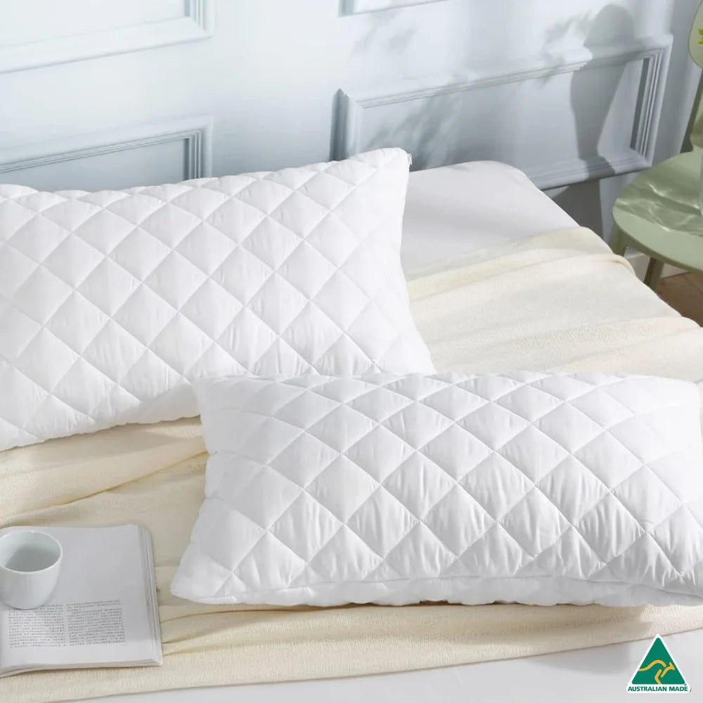 Luxury Quilted Pillow Case (2pcs) on bed with elegant diamond quilt design