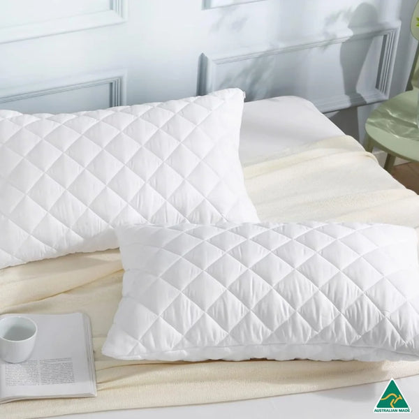 Luxury Quilted Pillow Case (2pcs) on bed with elegant diamond quilt design