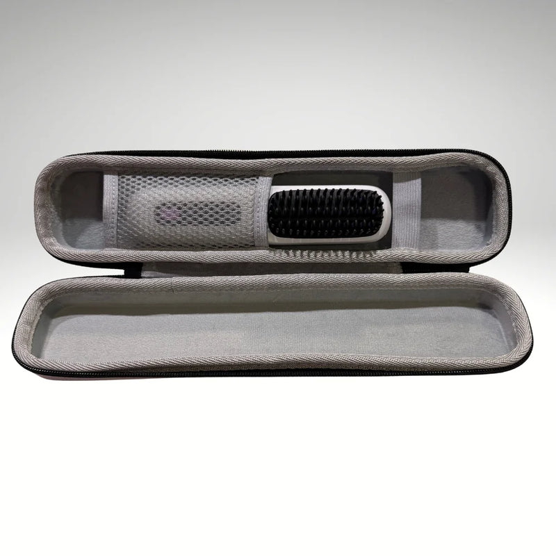 Open PureStraight hard shell travel case showing interior compartments.